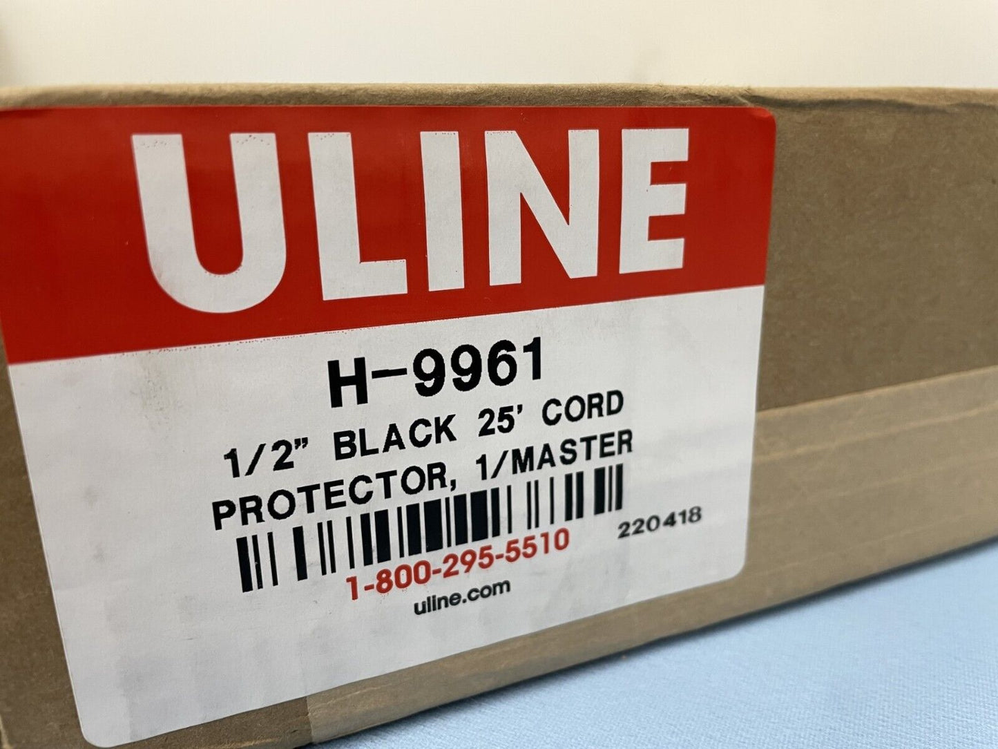Uline H-9961 Standard Black Flexible Durable Cable Protection 25' Cord Protector